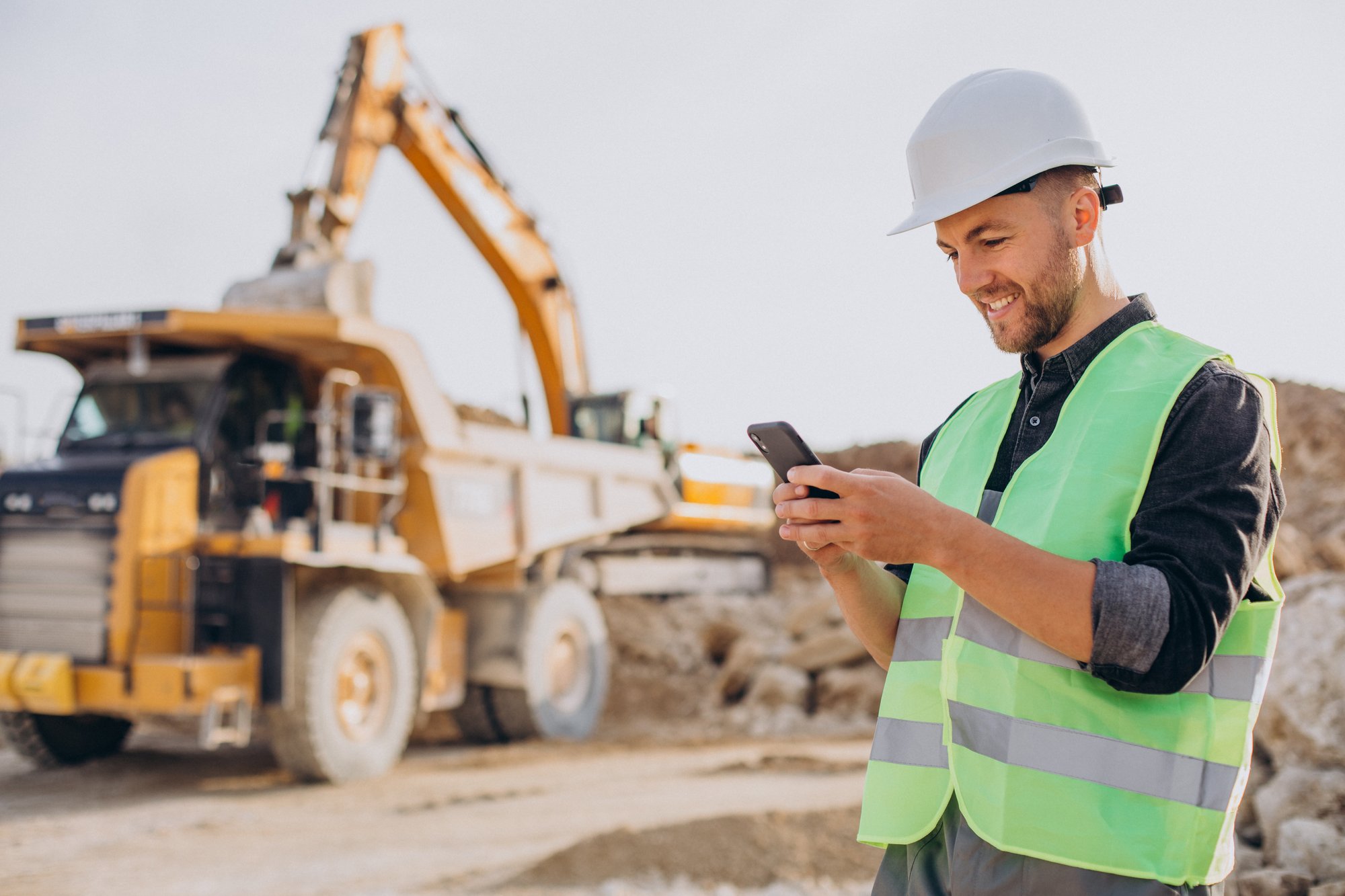 male-worker-with-bulldozer-in-sand-quarry